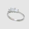 G39.  Platinum three stone princess cut diamond ring